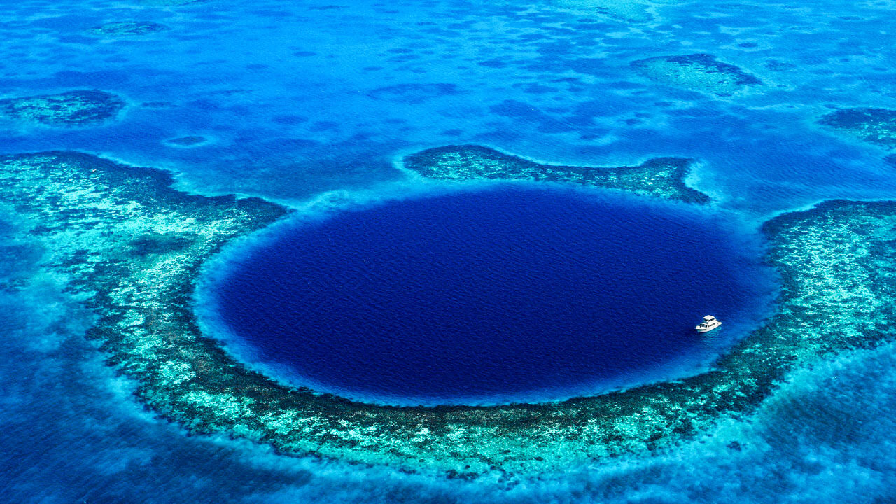 Самое глубокое место. Большая голубая дыра, Лайтхаус-риф. Большая голубая дыра Белиз. Голубая пещера, Белиз. Тонга Океанская впадина.